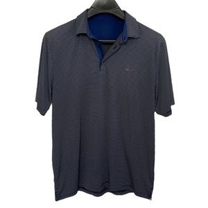 Greg Norman Size Large navy blue striped short sleeve polo golf shirt.‎